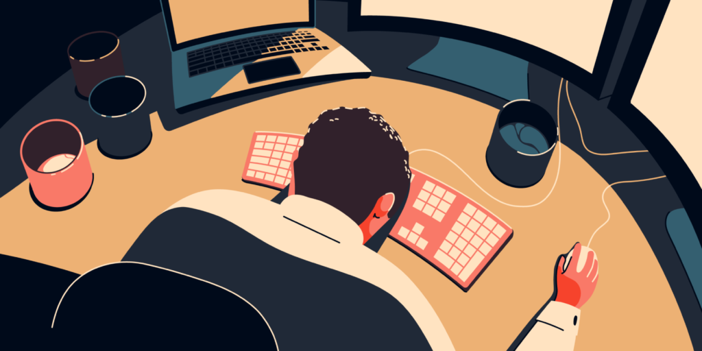 exhausted-man-in-front-of-a-computer-with-his-head